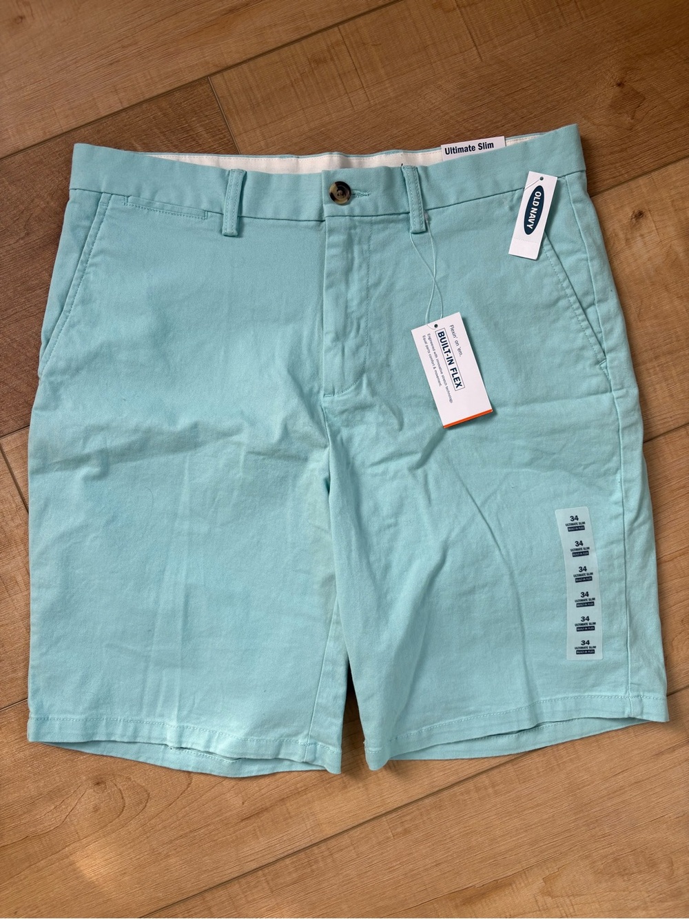 Old Navy Built-In Flex Mens Ultimate
Slim Khaki Shorts. Aqua Blue. Size 34